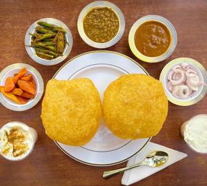 2 Plate Poori Chole + 2 Sweet/Salty Lassi