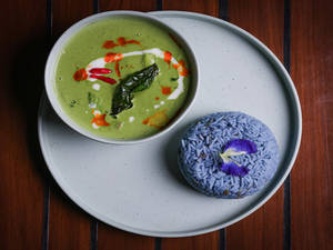 Thai Curry Green Served With Blue Rice