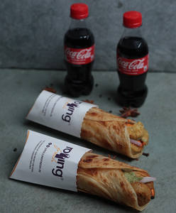 Sweet Corn Tikki Kathi Rolls (2 Pcs) + 2 Cokes [250ml]