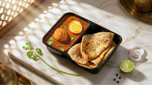 Egg Masala With Roti/ Paratha