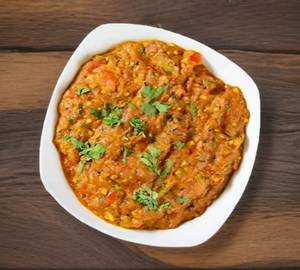 Ringan bharta + 1 butter bajri rotla achar mukhvas 