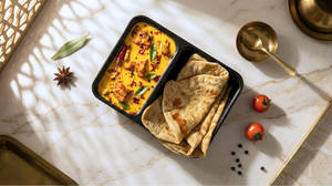 Kadi Pakoda With Roti/ Paratha