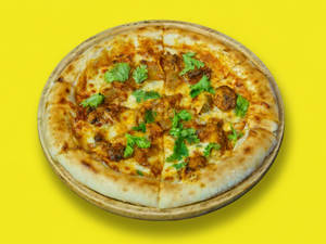 Dhamaka (Chicken Makhni Pizza)