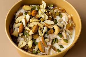 Creamy almond nut and fruits bowl