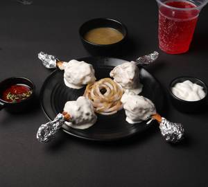 Creme chicken lollipop