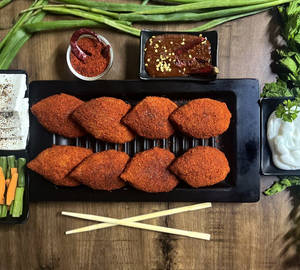 Fiery Golden Crispy Paneer Momos