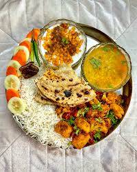 Rice dal sabji pickles and salad [1 person]