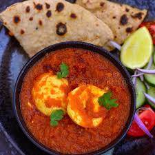 Egg curry [2 eggs] with 4 tawa roti [1 person]