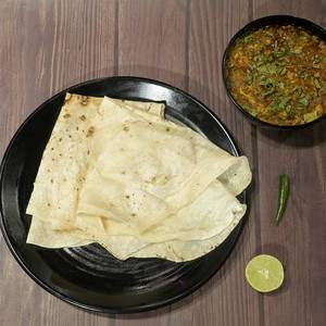 Egg Tadka With 3 Rumali Roti    
