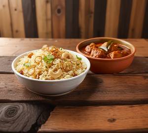 Ghee Rice with chicken pepper gravy 