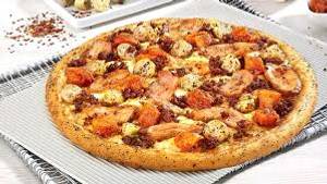 Overloaded chicken pizza