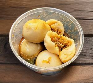 Kozhukattai with sharkara syrup 