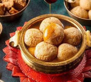 Nolen Gur Rasgulla ( Palm Jaggery Rasgulla)
