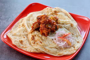2pc Parotta+ QTR Chicken Chilly