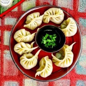 Butter momos [chicken]                                                                                                                                                            