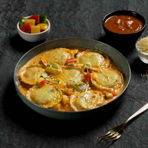 Ravioli In Creamy Tomato Sauce