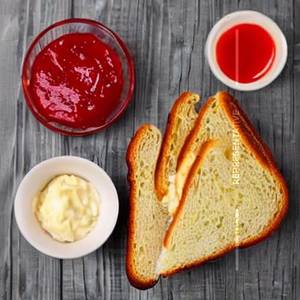 Bread butter jam cheese