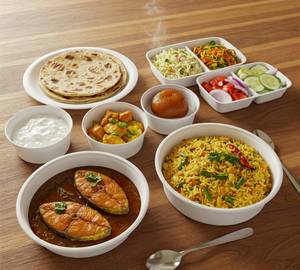 Maharaja Fish Thali (02 Paratha, Fried Rice, Fish Curry, Veg Sabji, Curd, Rasgulla, Pickle & Salad)