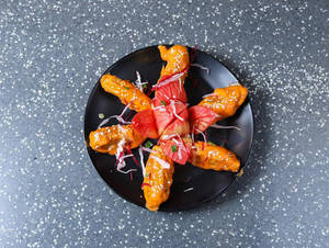 Veg Butter Masala Pan Fried Momos