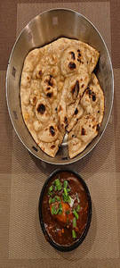 Chicken Manchurian Gravy (4pcs) + Tandoor Rooti With Butter (2pcs)