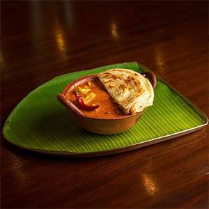 Malabar Parotta & Nalu Kattu Kozhi Curry