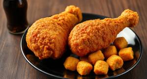 Fried & Crispy Chicken Leg (2 Pieces) With Popcorn  Chicken (Regular) And Soft Drink (1 Piece)