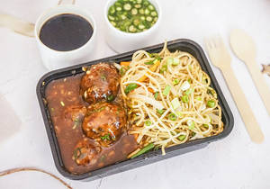 Veg Noodles With Veg Ball Manchurian Gravy