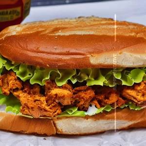 Hariyali Chicken Porotta Sandwich