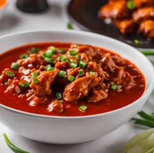 Chicken schezwan sauce gravy