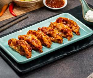 Schezwan Sauce Veg Momos (6 Pcs)