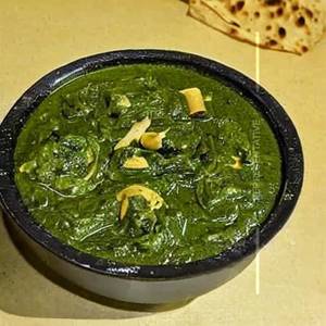 Palak Lasooni