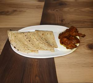 4 roti with chicken kosha and salad