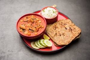 Kaju masala with paratha and rice combo