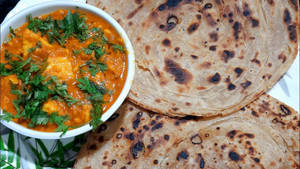 Paneer Butter Masala With Lachcha Paratha /2 Butter Naan