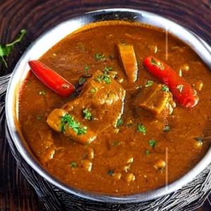 Veg Punjabi Kukkad Leg Piece Gravy