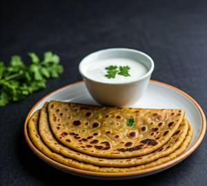 Aloo paratha with curd