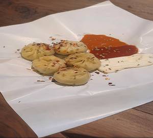Schezwan  steam momos