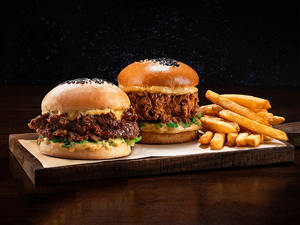 Non Veg Combo For 2 - Cluckinator + Saucy Clucker + Fries