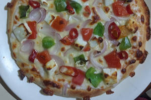 Chilli paneer (paneer onion capsicum red pep tom)