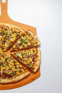Cheesy sweet corn pizza