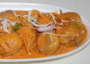 Veg tandoori gravy momos