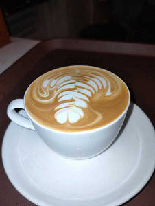 2 Cappuccino Hot Coffee + (free Snacks)