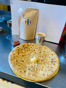 Aloo Pyaz Paratha + 300 Ml Chai