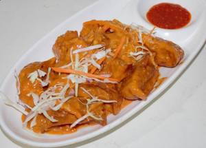 Chicken tandoori gravy momos                                                                                                                                                             