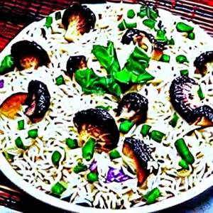 Veg Mushroom Schezwan Rice