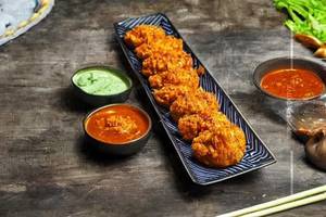 Chicken Achari Masala Momos