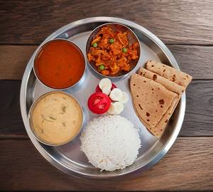 Ghar ki thali(3 chapati+seSonal sabji +ghee tadka curry+ rice+ dal +salad +mango pickle 