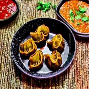 Momo in schezwan sauce