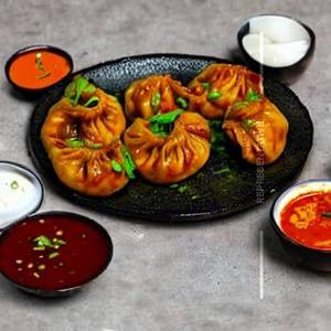 Momo in hot garlic sauce