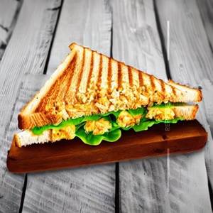 Egg chicken lays cheese sandwich